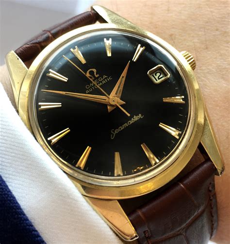 black and gold omega seamaster|Omega Seamaster gold bezel.